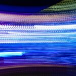 a blurry photo of blue and white lights